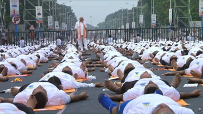 PM Modi guides participants amid performance as he leads Yoga Day celebrations from Kolkata’s Red Road (Updated 7.45 am)