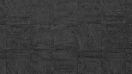 Photo a tile that is gray with a dark pattern