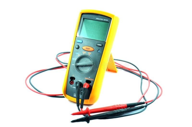 Voltage tester and basic electrical tools on a work surface