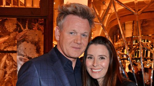 gordon ramsay in blue suit with wife tana smiling
