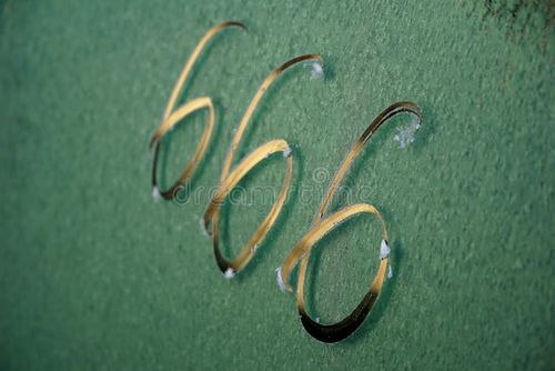 No. 666. The number three sixes in red paint on an old rusty blue surface. Number six hundred sixty six on a ragged metal surface. 666 stock images, royalty-free photos and pictures