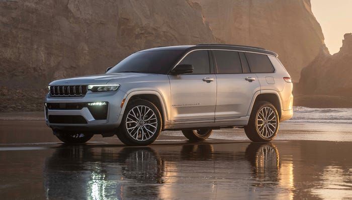 Jeep Grand Cherokee parked near the coast, showcasing refined SUV design and capability