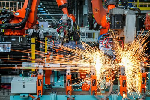 Industrial robots manufacture NEV components at Jinhua Zhixin Technology Co., Ltd. in Jinhua, Zhejiang Province, China, February 26, 2026. /VCG