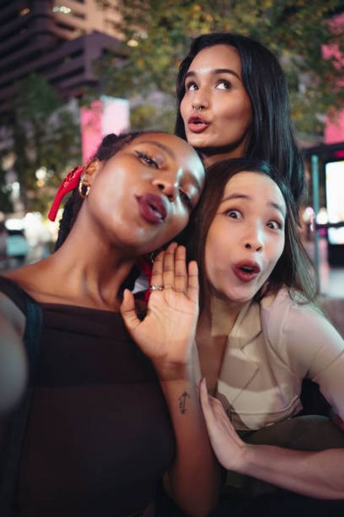 friends taking selfies in the city - funny face selfie stock pictures, royalty-free photos & images