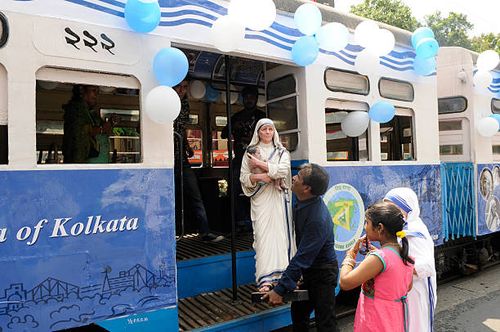 The tram decorated with Saint Mother Teresa’s pictures, posters, texts to mark canonization of Mother Teresa in front of Mother House, on September...