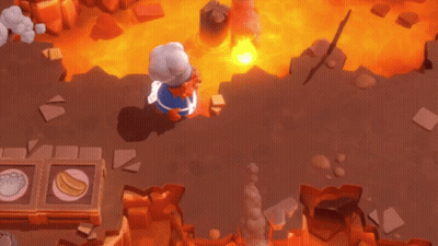 A Cartoon Character Is Laying On The Ground In Front Of A Large Fire GIF