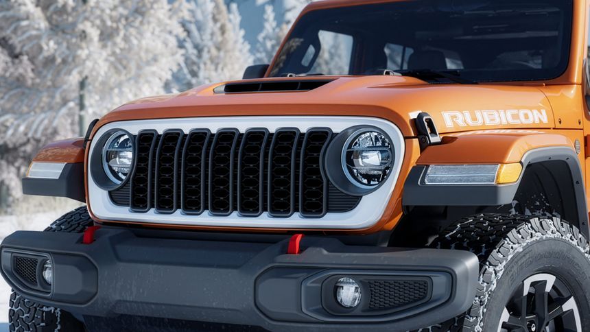 Front close-up of Jeep Wrangler Rubicon grille and LED headlights showcasing off-road styling