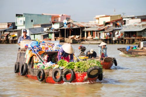 Scenic overview of a traditional floating market in a water town