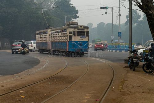 Kolkata, West Bengal, India - 23rd January 2020 : Electric Tram is passing through tram lines at Kolkata maidan area. It is the only tram system operating in India and oldest in Asia, 100 years old. Kolkata tram stock images, royalty-free photos and pictures