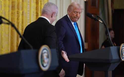 US President Donald Trump shakes hands with Prime Minister Benjamin Netanyahu after a news conference in the East Room of the White House on February 4, 2025, in Washington. (AP/Evan Vucci)