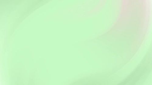 Soft green pastel background with smooth gradient texture.