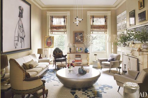 This image may contain Furniture Table Living Room Indoors Room Chair and Coffee Table