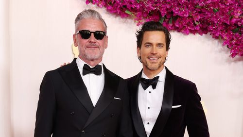 Simon Halls and Matt Bomer attend the 96th Annual Academy Awards on March 10, 2024 in Hollywood, California.